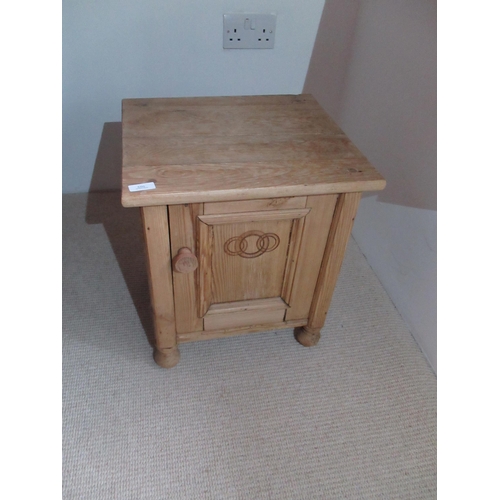 551 - A pine bedside cupboard