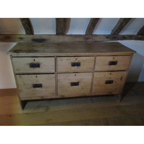 559 - A pine six drawer chest - Width 161cm x Depth 53cm x Height 87cm