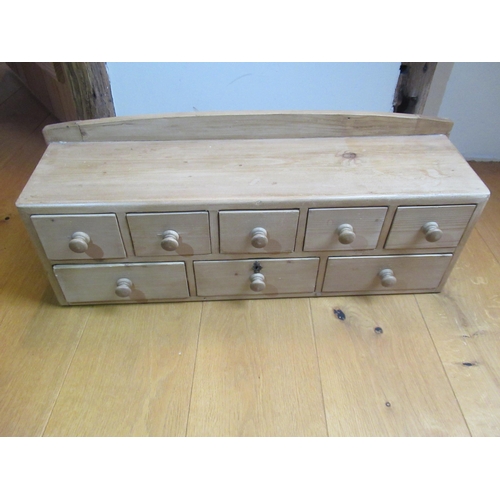 559A - A set of pine spice drawers - Width 68cm x Height 24cm