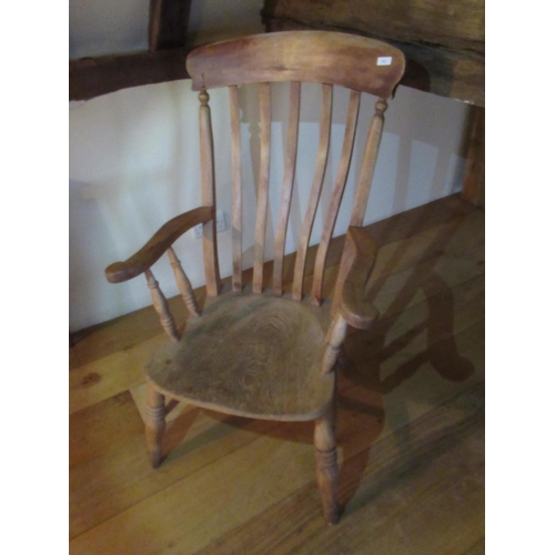 560A - A 19th century grandfather chair