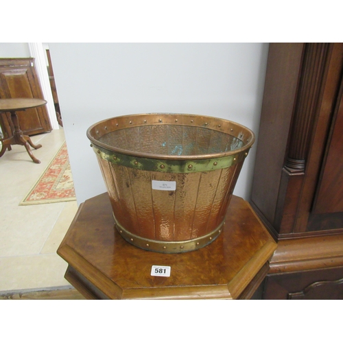 571 - A copper and brass planter/bucket - 31cm x 20cm