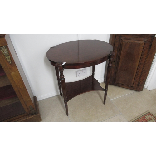 572 - A mahogany side table on reeded legs with a nice patina and in very good condition