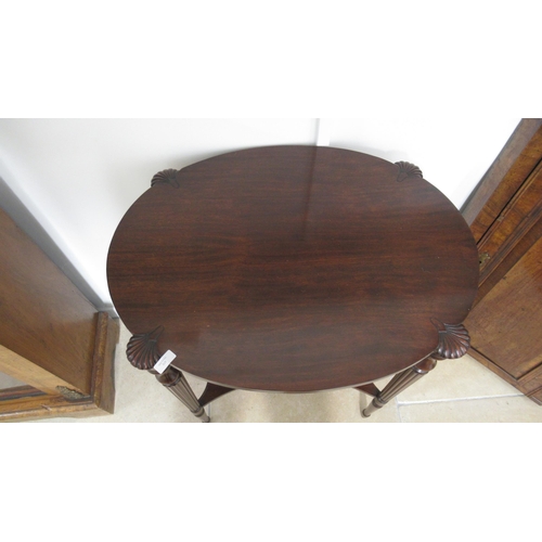 572 - A mahogany side table on reeded legs with a nice patina and in very good condition