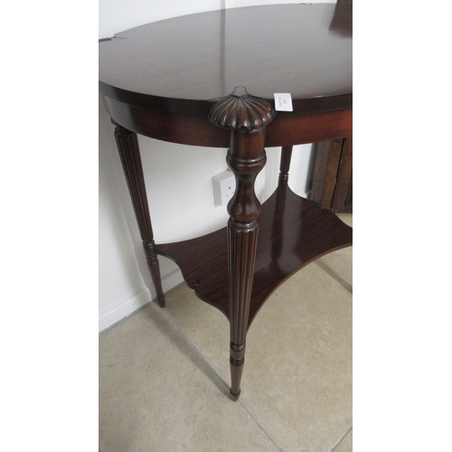 572 - A mahogany side table on reeded legs with a nice patina and in very good condition