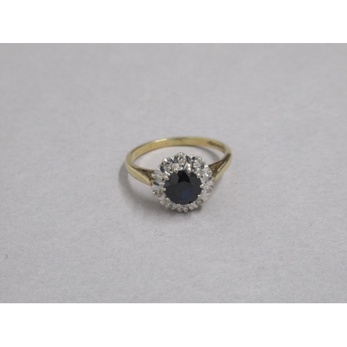 59 - An 18ct yellow gold sapphire and diamond cluster ring, hallmarked, size Q, approx 4grams