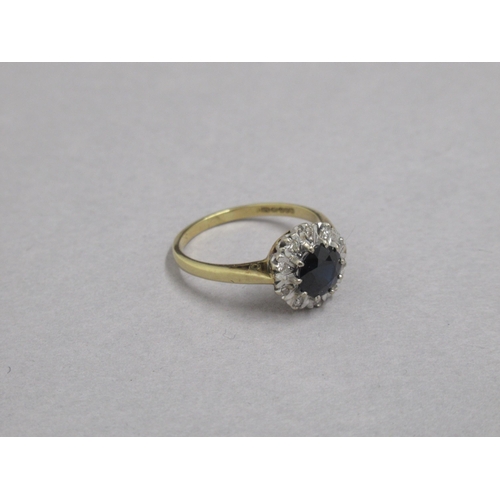 59 - An 18ct yellow gold sapphire and diamond cluster ring, hallmarked, size Q, approx 4grams