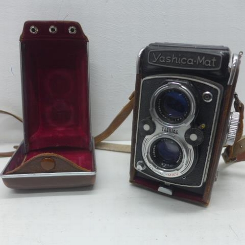 350 - A Yashica-Mat twin lens camera in its leather case