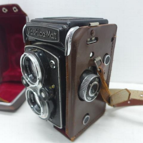 350 - A Yashica-Mat twin lens camera in its leather case