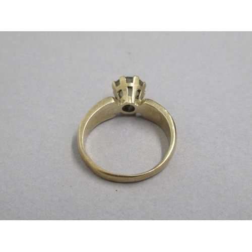 64 - A 9ct single stone ring, size L/M, approx 3 grams