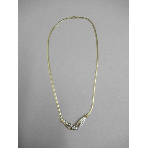 70 - A 10ct yellow gold (hallmarked) necklace with diamonds - 43cm - approx weight 9.2 grams