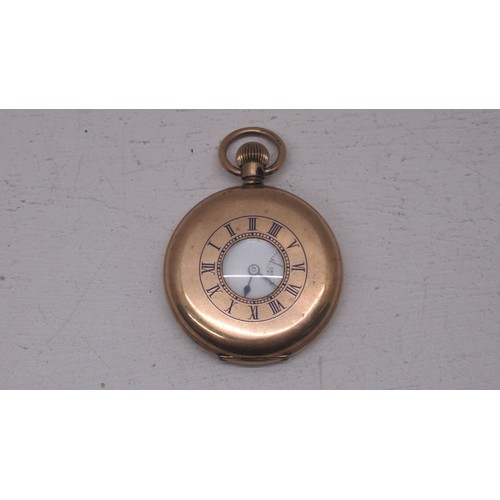 232 - An Elgin gold plated half hunter pocket watch - approx 5cm diameter - working in the saleroom but ne... 