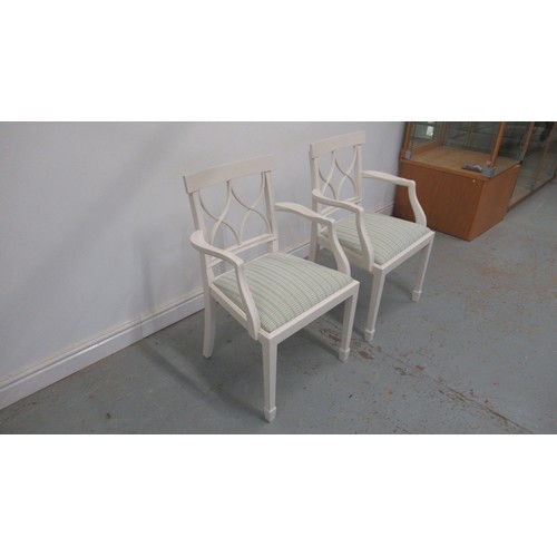 593 - A pair of Charles Barr painted armchairs