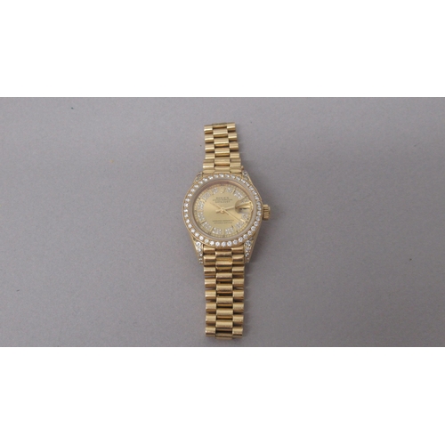 234 - A ladies 18ct yellow gold Rolex Oyster Perpetual Datejust bracelet watch, a champagne dial with diam... 