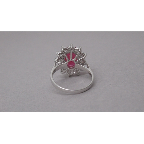 84 - A certificated 18ct white gold large oval ruby and diamond cluster ring - Ruby 3.71ct - round brilli... 