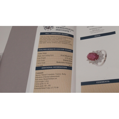 84 - A certificated 18ct white gold large oval ruby and diamond cluster ring - Ruby 3.71ct - round brilli... 