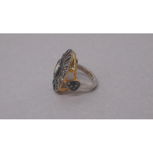 86 - A large silver and silver gilt dress ring set with vari cut diamonds - Diamonds 0.67ct - ring size K... 