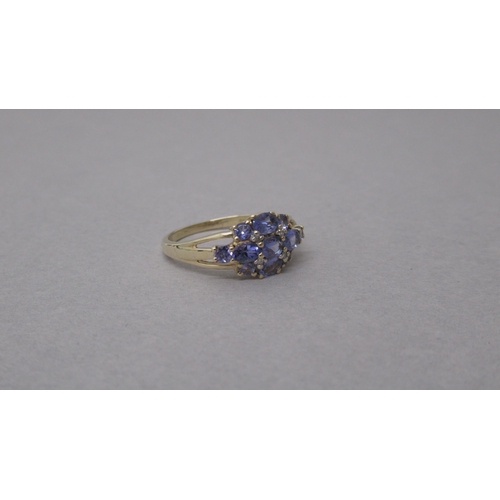 90 - A 9ct yellow gold tanzanite and diamond ring - head size approx 16mm x 9mm - ring size approx O/P