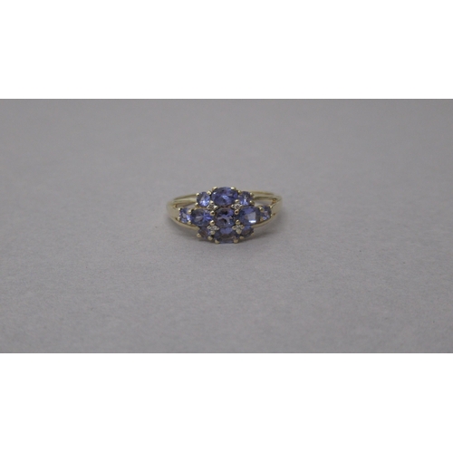 90 - A 9ct yellow gold tanzanite and diamond ring - head size approx 16mm x 9mm - ring size approx O/P