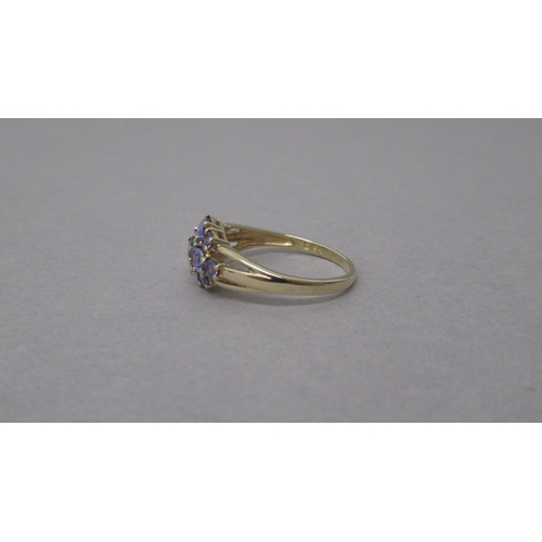 90 - A 9ct yellow gold tanzanite and diamond ring - head size approx 16mm x 9mm - ring size approx O/P