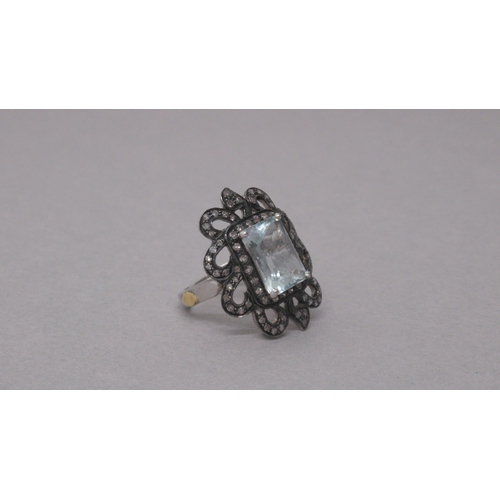 99 - A large silver gilt emerald-cut aquamarine and diamond ring - Aquamarine 4.60ct - Rose-cut diamonds ... 