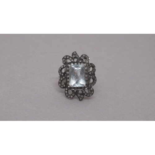 99 - A large silver gilt emerald-cut aquamarine and diamond ring - Aquamarine 4.60ct - Rose-cut diamonds ... 