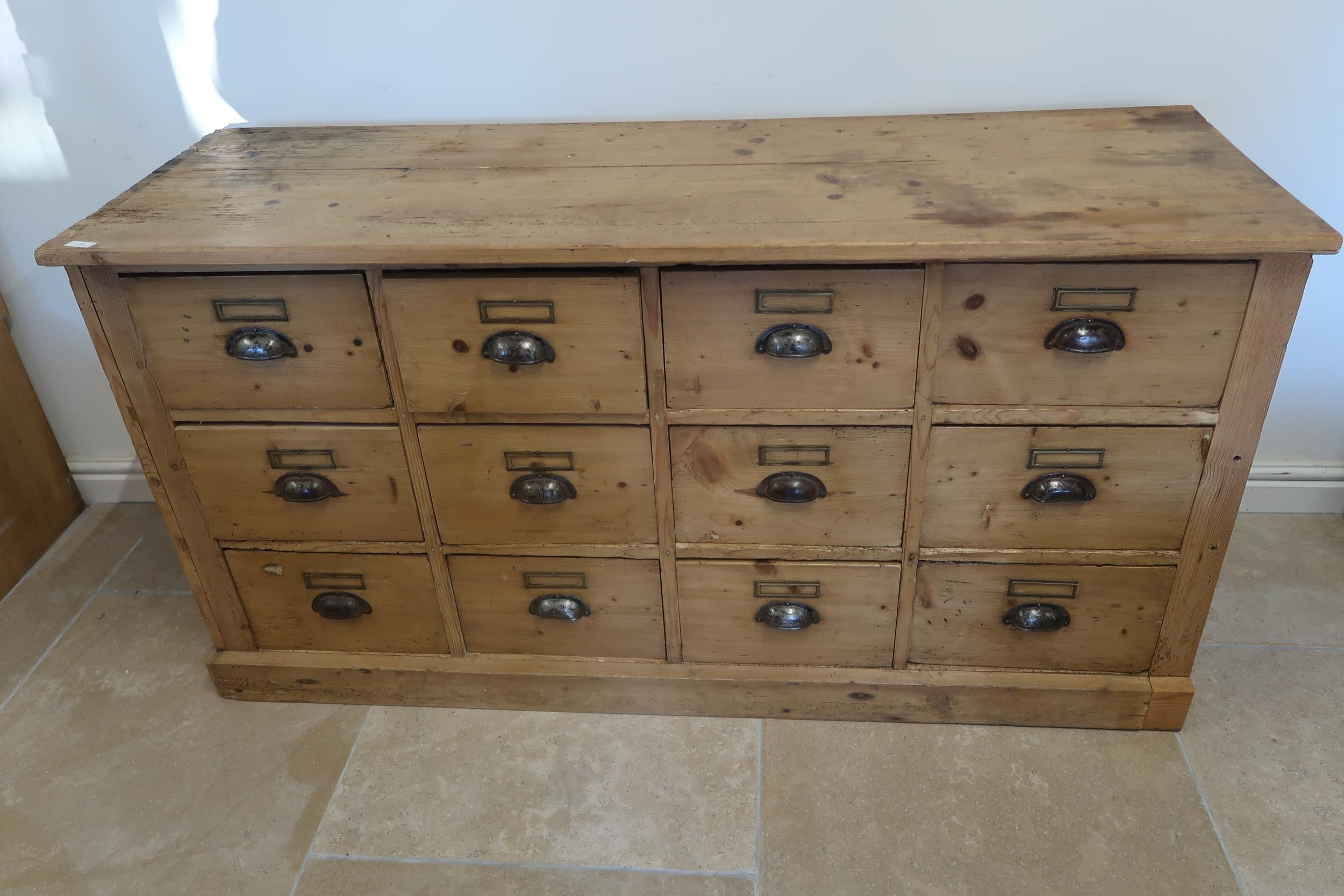 A Continental Pine 12 Drawer Chest Of Drawers Width 147cm X Height 77cm   1100244030.JPG