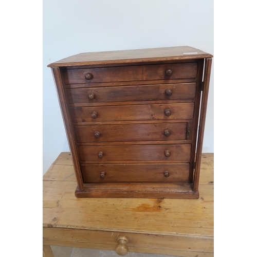 602 - A 19th century pine six drawer Wellington style chest - Height 47cm x Width 43cm x Depth 31cm