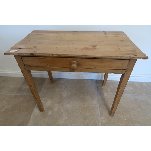 604 - A small pine side table - Width 75cm