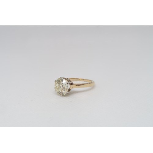 1A - An impressive 2.10ct diamond solitaire ring - The old brilliant cut diamond set in 14ct yellow gold ... 