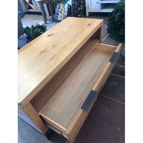 19 - Manhattan tv unit. Ex display. Needs a new adjustable screw foot to even