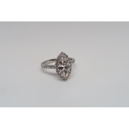 1 - A stunning Marquise cut diamond ring set in platinum - The central Marquise cut diamond 1.07ct, colo... 