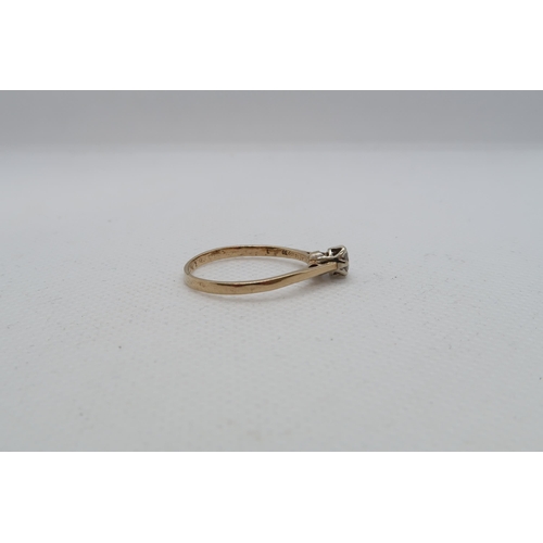 107 - A 9ct yellow gold 0.30ct diamond ring - carat weight marked on inside of ring - ring size approx S