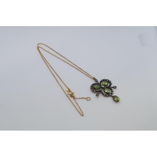 111 - A 9ct yellow gold and silver vintage style necklace set with peridots, diamonds and a seed pearl, bo... 