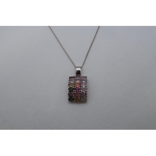 113 - A 9ct white gold (hallmarked) pendant with coloured stones - 3cm (in ring) approx weight 5 grams - o... 