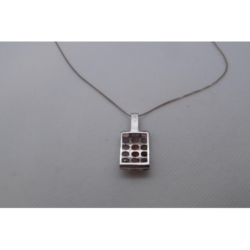 113 - A 9ct white gold (hallmarked) pendant with coloured stones - 3cm (in ring) approx weight 5 grams - o... 