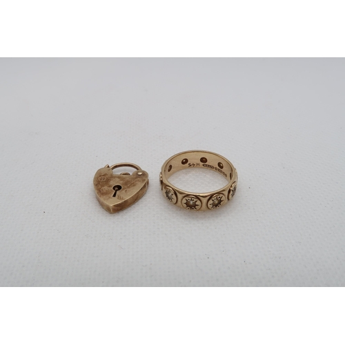 131 - A 9ct yellow gold (hallmarked) band ring size N and a 9ct (hallmarked) heart lock - total weight app... 