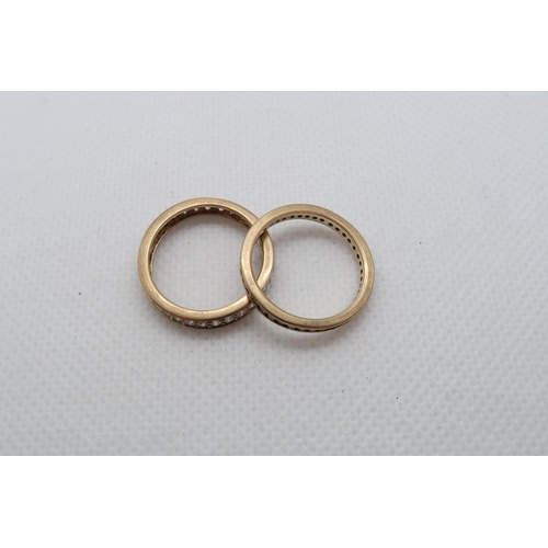 137 - Two 9ct yellow gold (one hallmarked, one tested approx) and diamond eternity rings - sizes M and N -... 