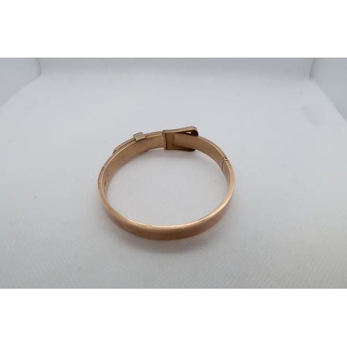 138 - An Edwardian 9ct rose gold (hallmarked) hinged buckle bangle with seed pearls - approx weight 15.1 g... 