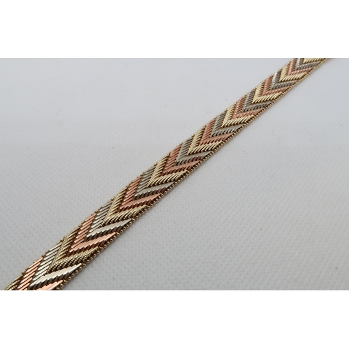 141 - A 14ct (hallmarked) tri colour gold bracelet - approx 18cm - weight approx 36.2 grams