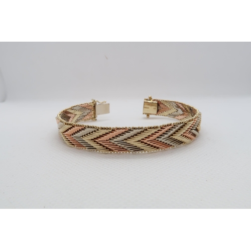 141 - A 14ct (hallmarked) tri colour gold bracelet - approx 18cm - weight approx 36.2 grams