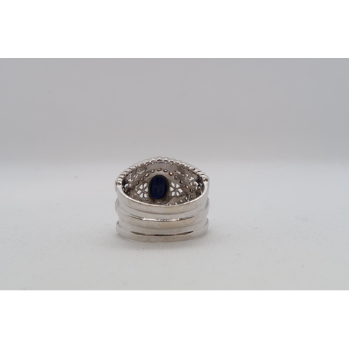 148 - A 14ct white gold (hallmarked) ring with diamonds and spinel - ring size N - approx weight 6.7 grams