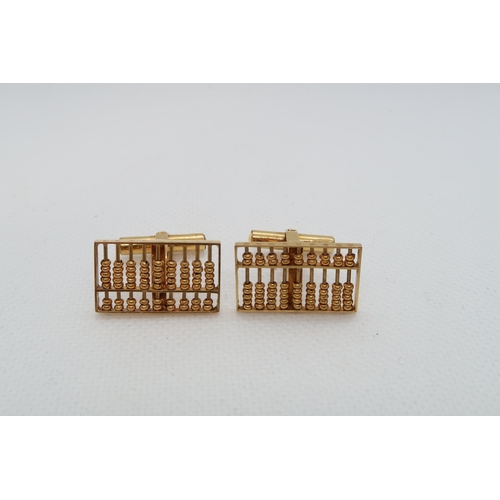 149 - A pair of 14ct (hallmarked) yellow gold cufflinks shaped as Abacus - approx 2cm x 1.5cm - weight app... 