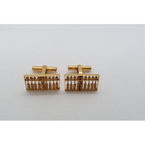 149 - A pair of 14ct (hallmarked) yellow gold cufflinks shaped as Abacus - approx 2cm x 1.5cm - weight app... 