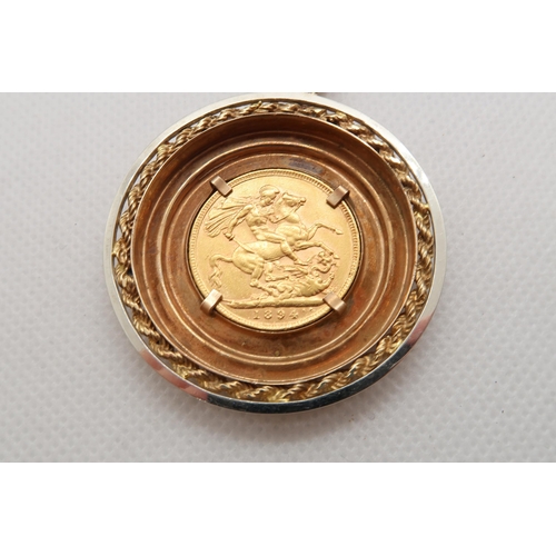 153 - An 1894 gold sovereign set as a pendant in 9ct gold (hallmarked) gold - approx 4.5cm diameter - appr... 