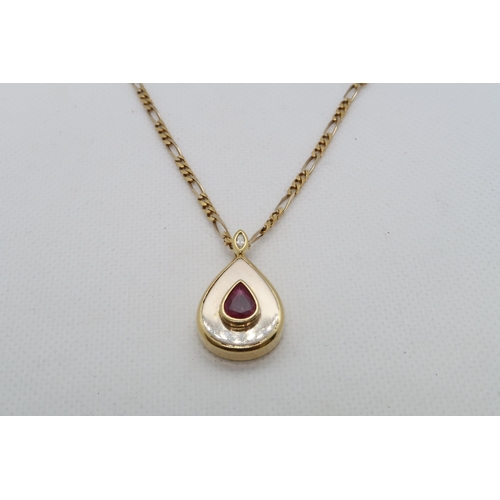 158 - An 18ct yellow gold (hallmarked) pendant on chain - Drop shaped and set with ruby and diamond accent... 