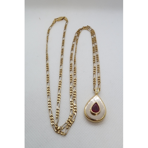 158 - An 18ct yellow gold (hallmarked) pendant on chain - Drop shaped and set with ruby and diamond accent... 