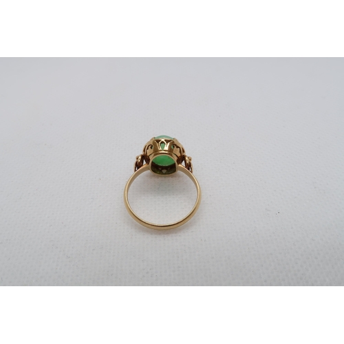 160 - A 18ct yellow gold (hallmarked) ring with Jade - ring size N/O - weight approx 3.9 grams