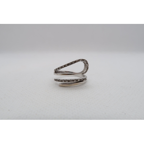 169 - An 18ct white gold (hallmarked) ring with diamonds - ring size O - approx weight 5.8 grams