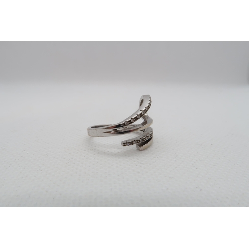 169 - An 18ct white gold (hallmarked) ring with diamonds - ring size O - approx weight 5.8 grams