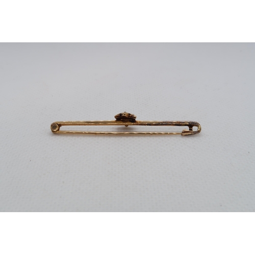 171 - A 9ct yellow gold (hallmarked) bar brooch with star set with turquoise and diamond - 5cm - weight ap... 